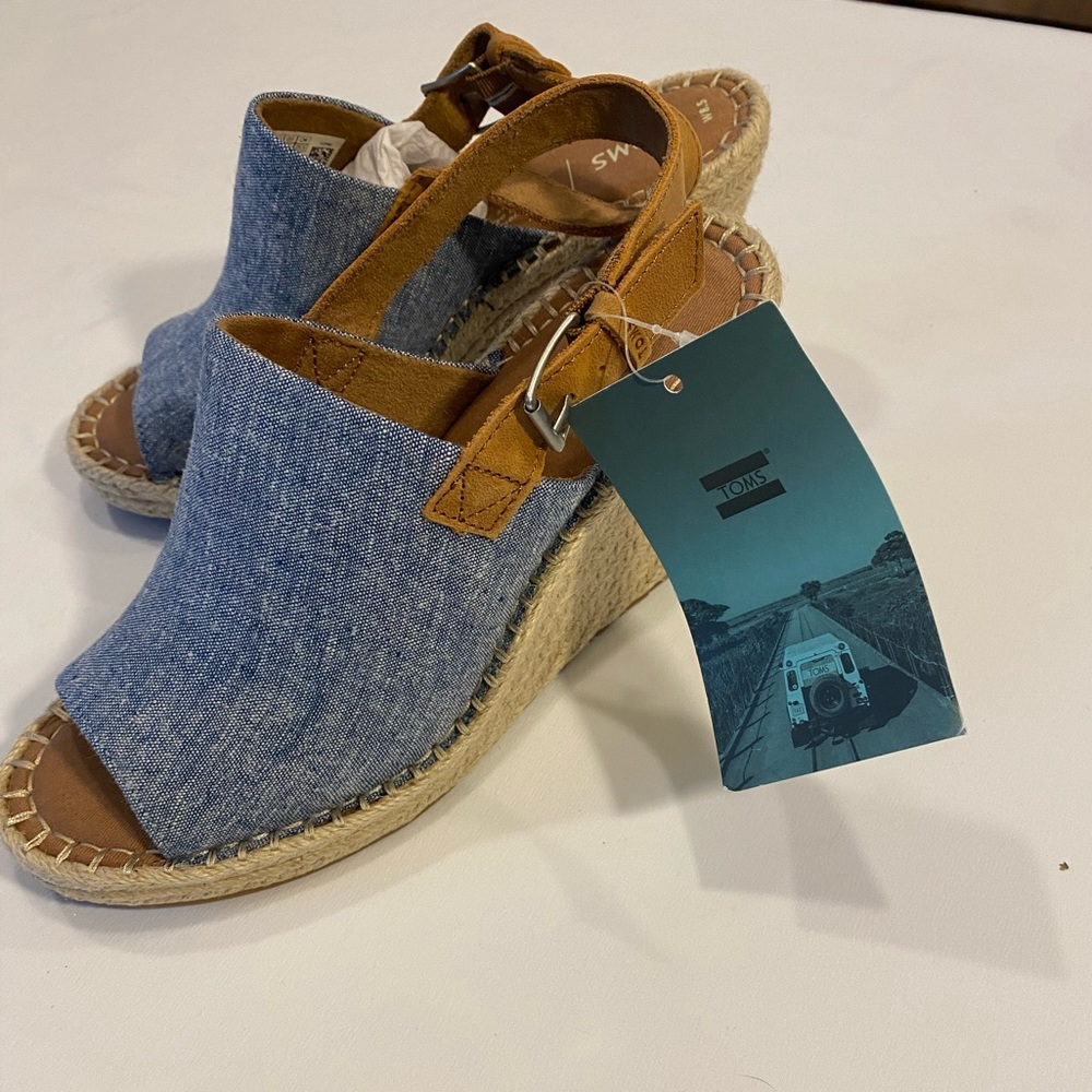 Never worn brand new , color is denim